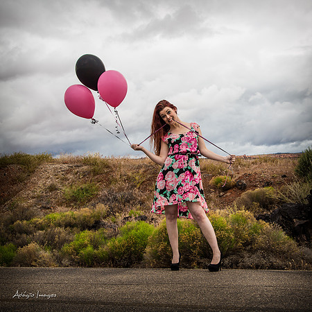A girl and her balloons