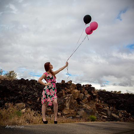 A girl and her balloons