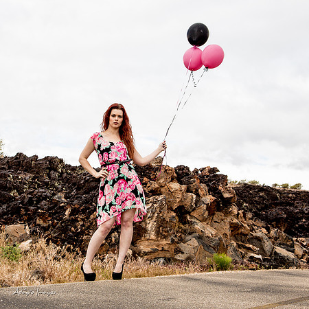 A girl and her balloons
