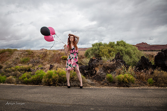 A girl and her balloons