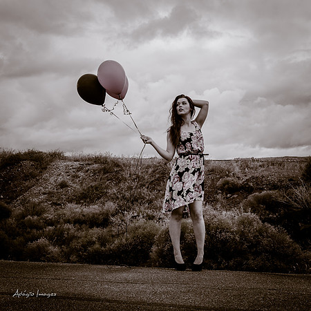 A girl and her balloons