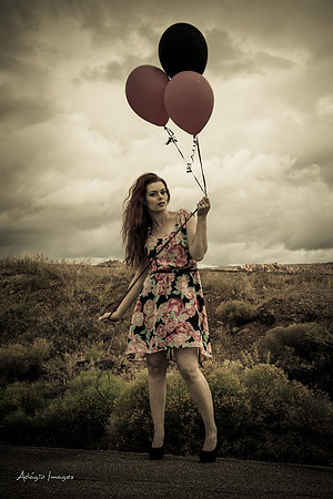A girl and her balloons