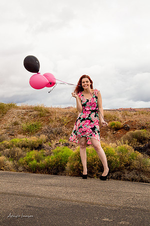 A girl and her balloons