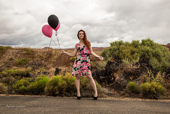 A girl and her balloons