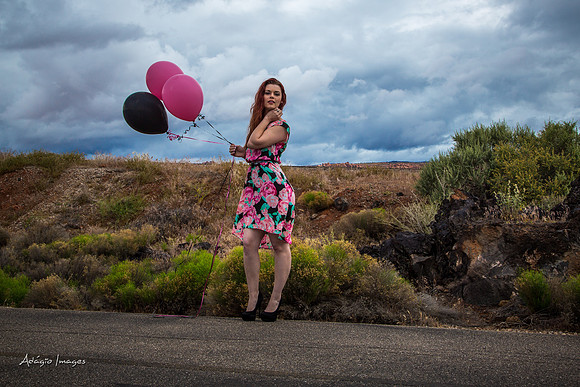 A girl and her balloons