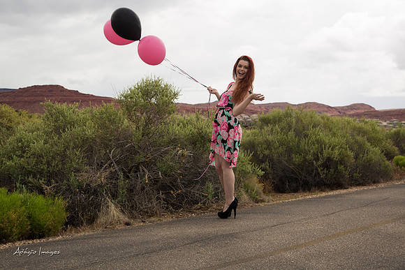 A girl and her balloons