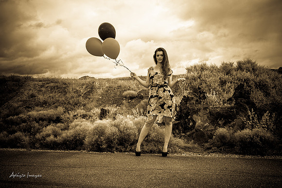 A girl and her balloons