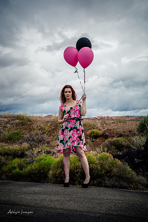 A girl and her balloons