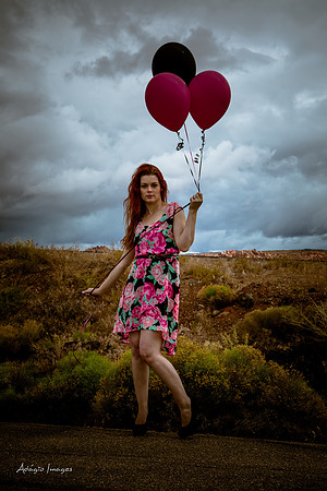A girl and her balloons