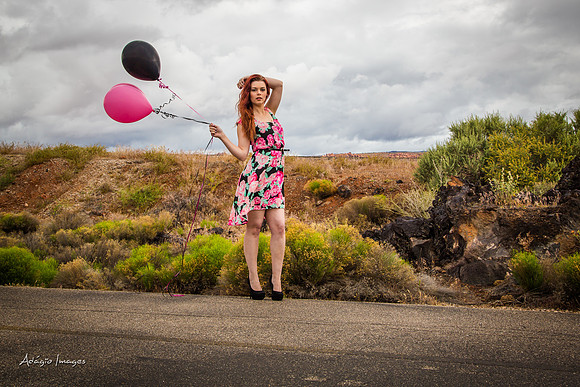 A girl and her balloons