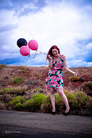 A girl and her balloons