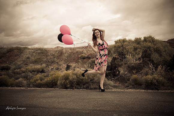 A girl and her balloons