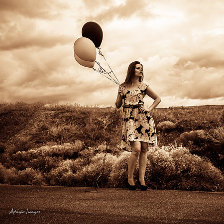 A girl and her balloons