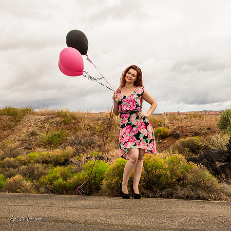 A girl and her balloons