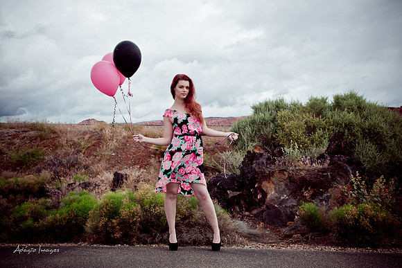 A girl and her balloons