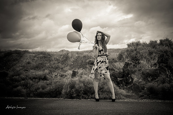 A girl and her balloons