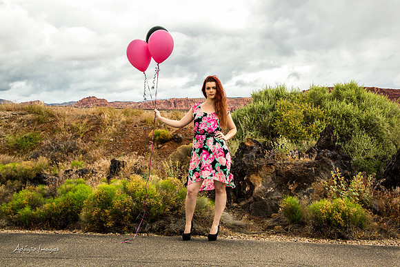 A girl and her balloons