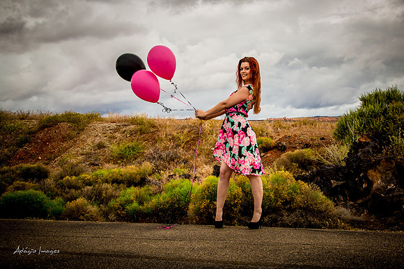 A girl and her balloons